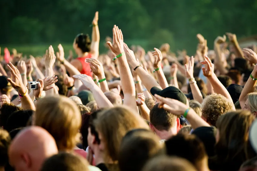 Crowd of people raising their hands, like wireless clients asking to talk